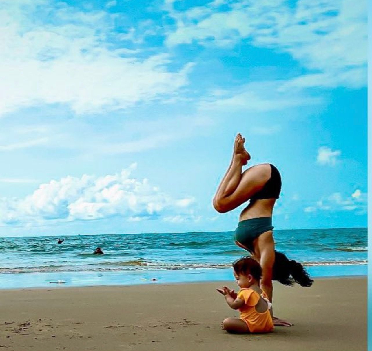 Xuan doing yoga on the beach